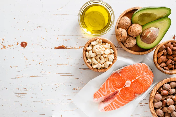 healthy fat can be found from a variety of different sources including salmon, nuts, seeds, avocado, and olives.