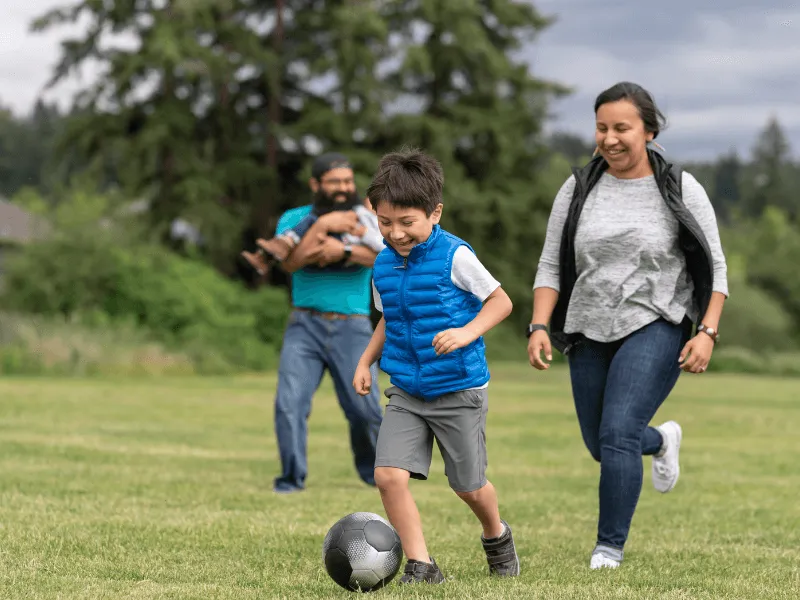 playing football with the family