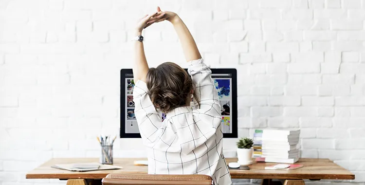Woman sitting at her desk