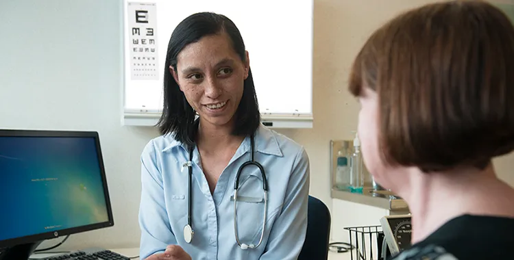 Women at doctor's getting a heart check