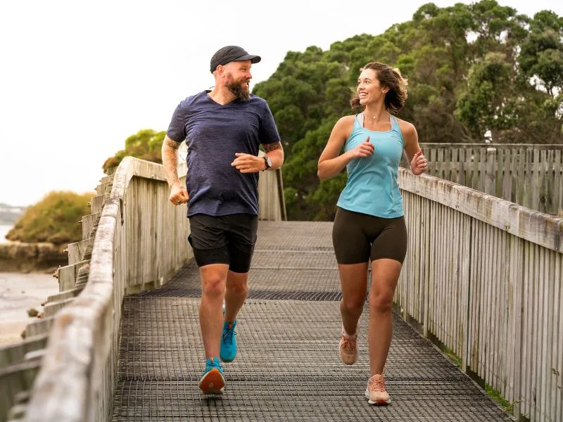 Two people running for healthy heart health