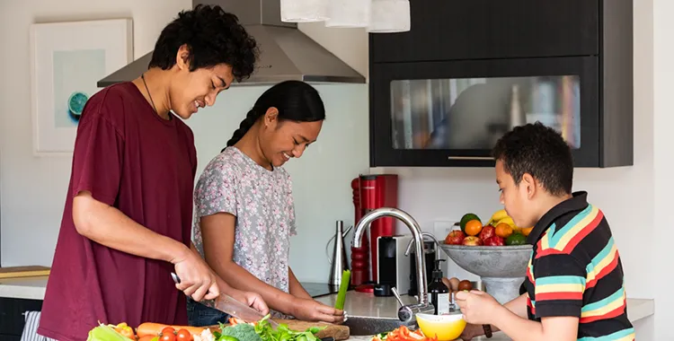 Family at table eating healthy food