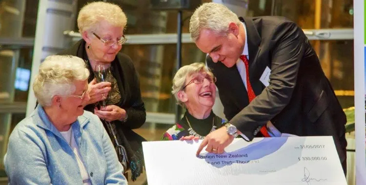 ryman ceo presents cheque