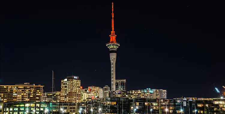 Auckland Sky Tower with red lights at night