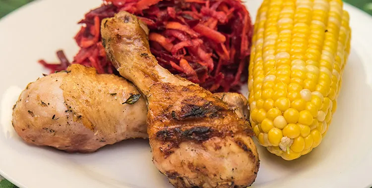 fresh corn and chicken cooked on the bbq