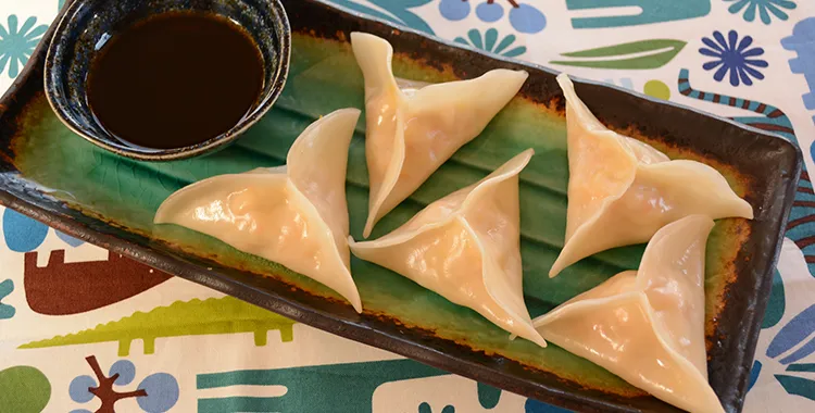 Steamed fish dumplings with a citrus and soy sauce