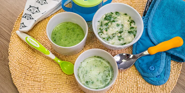 Fish congee in bowls with baby spoons