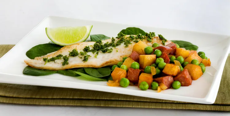Visual of fish with potato, peas and chorizo