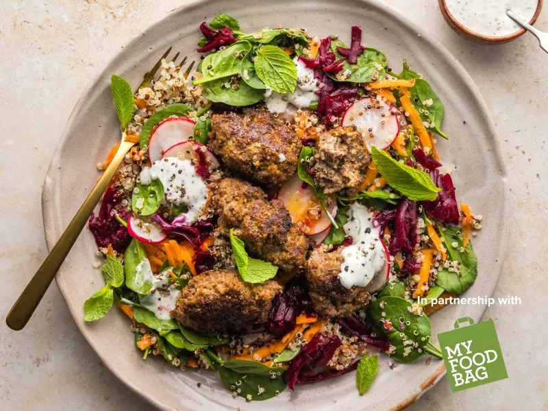 Greek-inspired lamb kofta served on a colourful quinoa salad with spinach, beetroot, carrot and radish, drizzled with creamy tzatziki, My Food Bag partnership dish