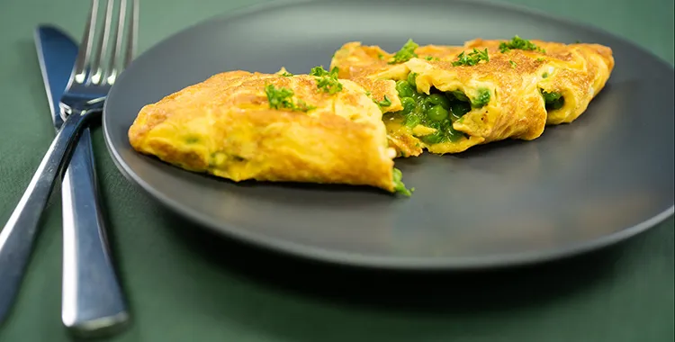 Pea and cheese omelette on a plate