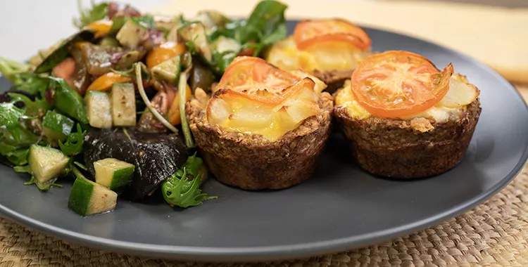 Pea and tomato quiche on a plate