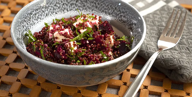A bowl of quinoa and beetroot salad