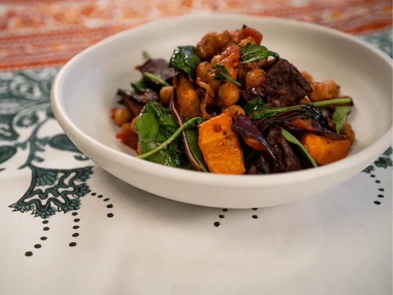 Here's a healthy vegetarian recipe to try for dinner. Roasted vegetables with chickpeas and tomatoes. A quick and healthy meal. Get the recipe.