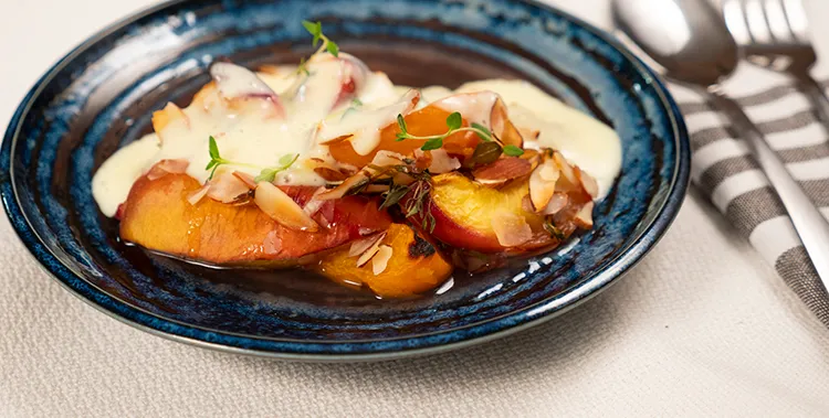 Thyme roasted stone fruit with almonds and honey