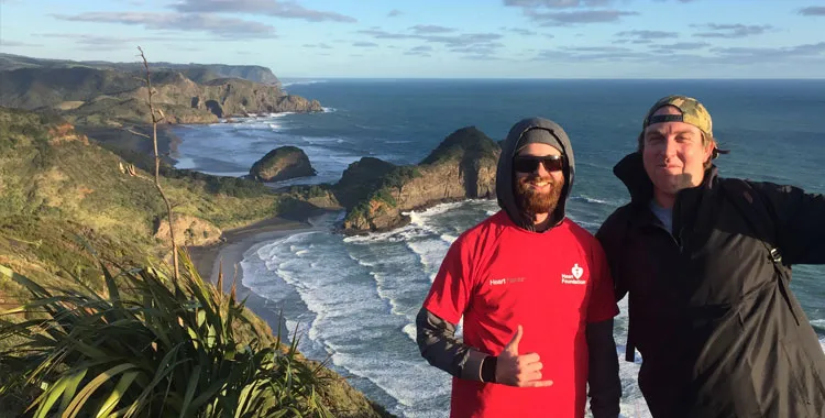 Bevan Ellis and his friend at Piha