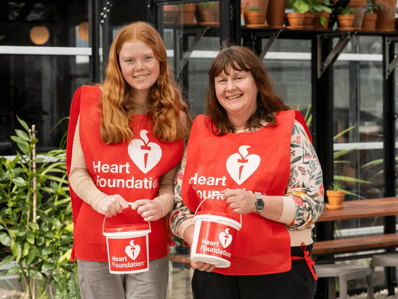 An image of two volunteers during the Heart Foundation's Big Heart Appeal, street collection drive.