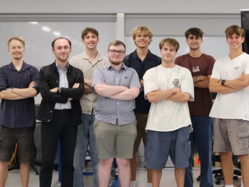 An image of NZ students from the University of Canterbury working in the Heart Hackathon competition.