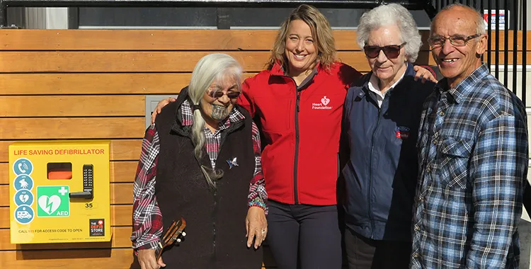 People standing with Maketu defibrillator
