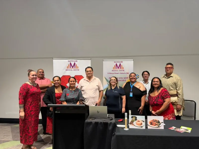 Pasifika community members and Maxcare medical staff standing together at a Heart Foundation Pacific Heartbeat heart health and nutrition workshop in New Zealand.