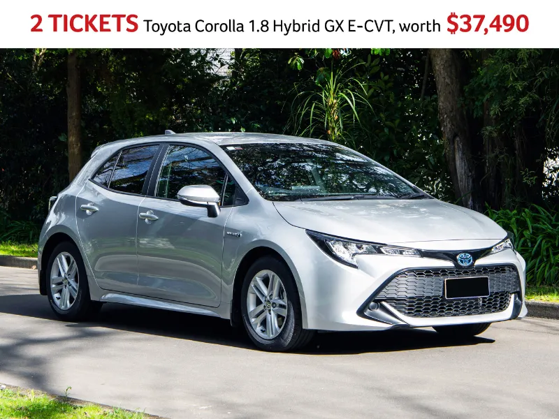 Toyota Corolla 1.8 Hatch Hybrid GX E-CVT in silver, parked outdoors on a sunny day, highlighting modern hatchback design and hybrid features, valued at $37,490.