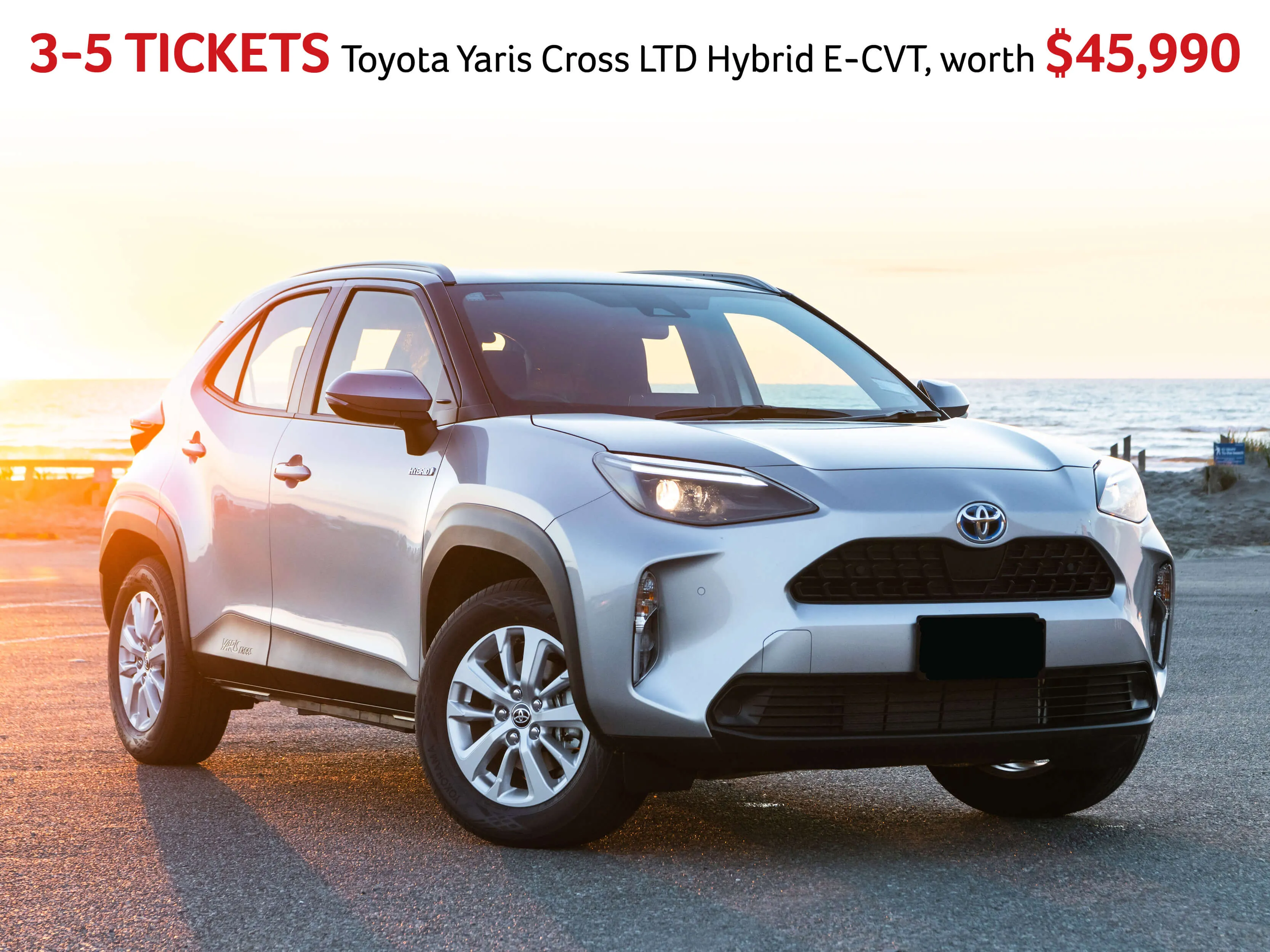 Toyota Yaris Cross LTD Hybrid E-CVT in silver, parked by the beach at sunset, highlighting compact SUV design and hybrid features, valued at $45,990.