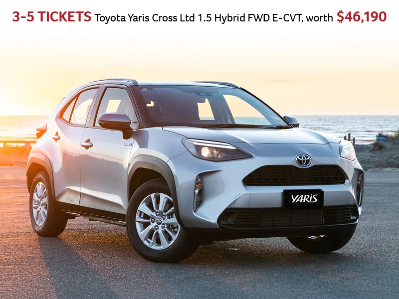 Toyota Yaris Cross 1.5 Hybrid SUV prize image with car parked near beach at sunset
