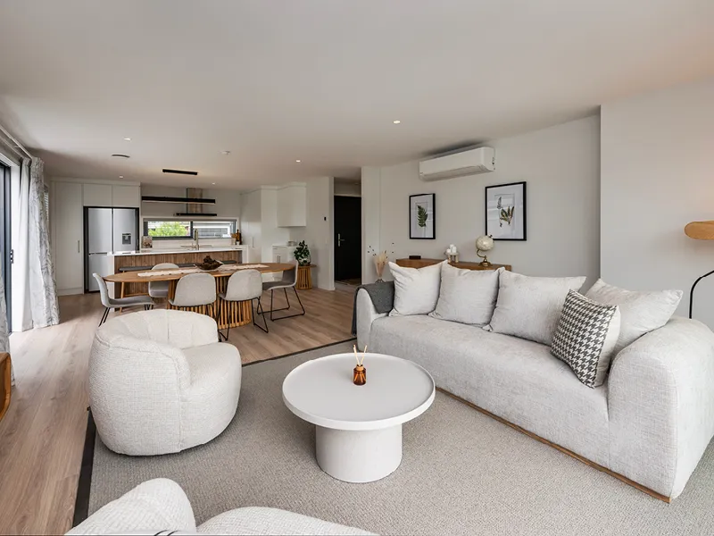 Open-plan living and dining area of the Heart Foundation Home Lottery 162 three-bedroom house in Richmond, Nelson with contemporary neutral décor.
