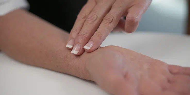 Person checking pulse