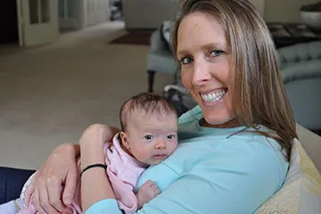 Anna with her baby who was born after her SCAD event