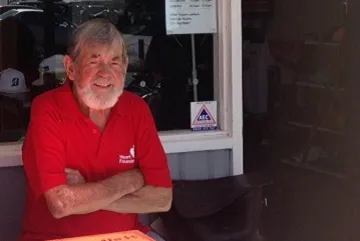 A photo of Giff sitting at a table, he is a gentleman who underwent heart bypass surgery