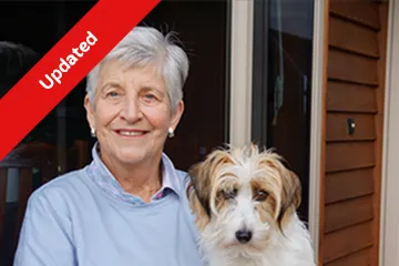 Jeanette recovering from heart surgery, pictured with her dog