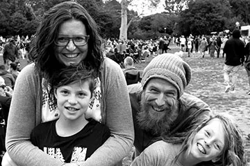 Jo pictured with her husband and two boys