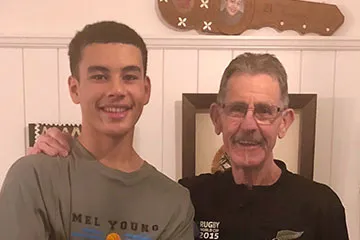 John-pictured-with-his-grandson