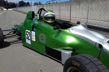 Robin enjoying his racing car after his heart attack