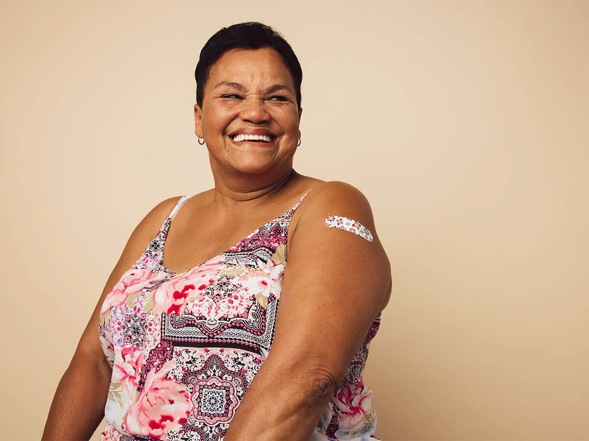 Lady receiving a vaccination