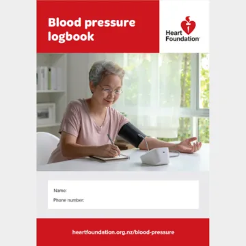 Cover page of Blood pressure my logbook, with space to write name and phone number of the patient. Having an image of a women monitoring her blood pressure.