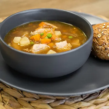 chicken and vegetable soup with whole grain bun